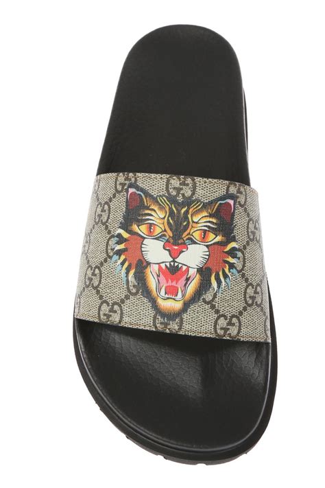 gucci tiger slip on replica|how to identify gucci slides.